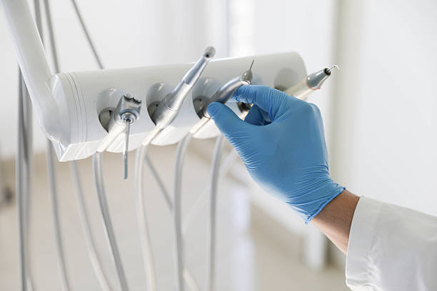 Professional Tooth Extraction technician working in Page County County, IA